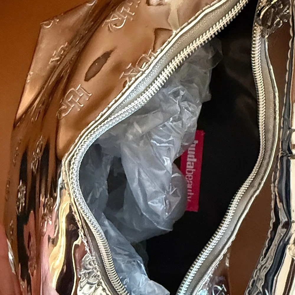 Huda Beauty Metallic Silver Shoulder Bag with Monogram Detail